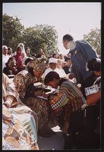 [Elaine Steele talking to Ayind&eacute; Jean-Baptiste, Million Man March,  Washington, D.C., 1995] [graphic].