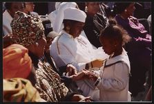 [Rosa Parks talking to a young girl, Million Man March, Washington, D.C., 1995] [graphic].