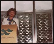 [Woman speaking at a Wayne State University event, Detroit, Michigan, 1990] [graphic].
