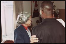 [Rosa Parks visiting friends and family during a visit to Cailfornia, 1990] [graphic].