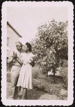 [Portrait of a soldier and woman, standing outside] [graphic].