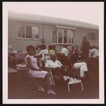 A group of friends at the home of Pat & Alvin Cadwell, Raymond Parks, standing, back to the camera [graphic].