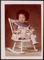 [Portrait of toddler sitting in rocking chair] [graphic].