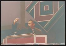 [Preacher speaking from podium] [graphic].