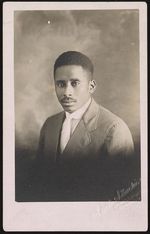 [Young unidentified, African American man, three-quarter length portrait, seated, turned left, facing front] [graphic] /