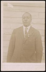[Unidentified African American man, three-quarter length portrait, standing, facing front] [graphic].