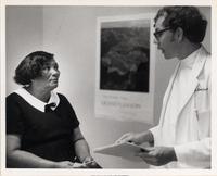 Doctor with patient, Fayette, Mississippi