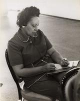 Woman taking notes