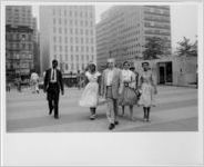 [Little Rock Nine students walking in the city, New York, NY, 1958]