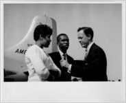 [A reporter interviews Little Rock Nine students after their arrival at La Guardia Airport, New York, NY, 1958]
