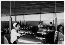 [Little Rock Nine students on the bumper cars, New York, NY, 1958]