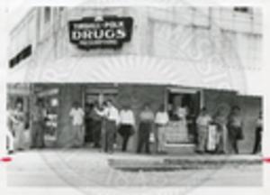 Carroll Gartin speaking outside of Tindall Polk Drugs
