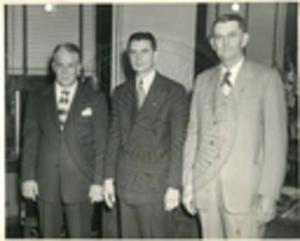 Carroll Gartin with two unidentified men