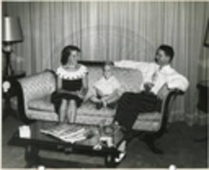 Carroll Gartin with wife and son