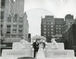 Parade float representing a wedding between Agriculture and Industry