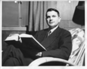 Carroll Gartin reading a book