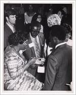 [Barbara Jordan Surrounded by Guests]