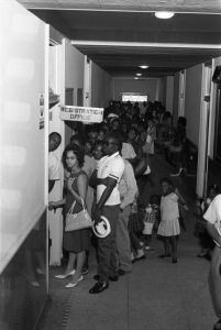 Citizens waiting to register to vote