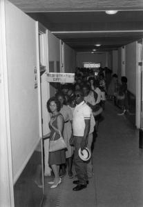 Citizens waiting to register to vote