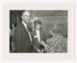 Photograph of Augusta Baker Conversing with Couple