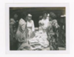 Photograph of Augusta Baker Speaking With Librarians