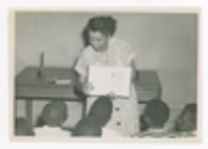 Photograph of Augusta Baker Reading to Children