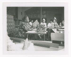 Photograph of Augusta Baker Reading to a Group of Women