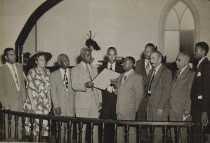 Photograph, 1951 June 17, (Clarendon County, S.C.), E.E. Richburg, Modjeska Simkins, J.W. Seals, Joseph A. De Laine, Sr., Harry Briggs, John McCray, J.S. (Flutie) Boyd, James Hinton, and Eugene Montgomery