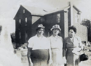 Photograph, [1900s], of three unidentified women