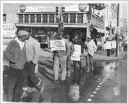 Striking sanitation workers picketing on Beale Street, Memphis, 1968