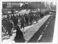 Sanitation workers and Memphis Mayor Loeb walk to the Auditorium, 1968