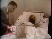 WSB-TV newsfilm clip of Dr. Martin Luther King, Jr. recovering from surgery after being stabbed and of his wife and other hospital visitors in New York City, New York, 1958 September 22