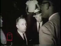 WSB-TV newsfilm clip of Mayor Julian R. Stinson speaking to Reverend Lendall W. Chase after a civil rights demonstration in Danville, Virginia, 1963 June 13