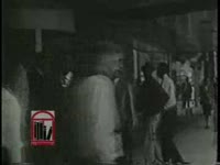 WSB-TV newsfilm clip of civil rights workers holding a sit-in and picketing in downtown Atlanta, Georgia, 1960 November 25