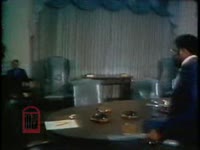 WSB-TV newsfilm clip of a meeting between the Bibb County Board of Commissioners and members of a special committee of the local branch of National Association for the Advancement of Colored People (NAACP) urging equal employment opportunities for African Americans; also Mayor Ronnie Thompson speaks to a meeting of the Optimists Club, Macon, Georgia, 1971 July 20