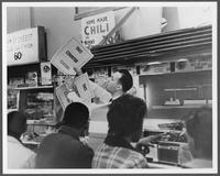 Students conduct a lunch counter sit-in