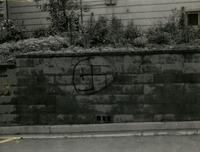 Swastika painted on wall on Madison Street, Farmville, Va., June 1962, #002