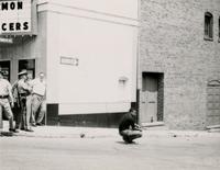 Police and men outside State Theater, Farmville, Va., [undated]
