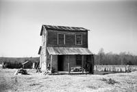 House inhabited by an African American man on secondary road 632, Prince Edward County, Va., 1962-1963
