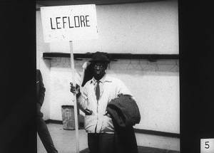 Man Holding Sign