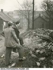Russell Lane Examines Debris