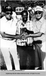 Retired Sergeant James "Bruiser" Gaines and Captain Anthony Watkins Receive Special Trophy at the Dustbowl Tourney