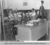 Workers in the Newspaper Office